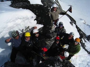 Climbers celebrate a group summit in Alaska.