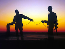 Climbers coil their rope at the end of a great day at Mt. Erie.