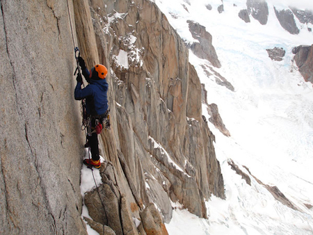 Climber working his way up Cerro Torre in Patagonia, Argentina.