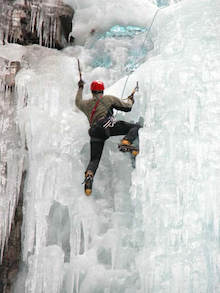 Ice is a constantly changing and always interesting medium. A climber negotiates a very featured section of climbing.