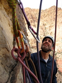 A climber belaying a leader in Red Rock Canyon. Scott Massey
