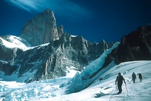 Climbers on the Glacier de los Tres approaching Cerro Velluda with the East Face of Fitzroy in the background.
