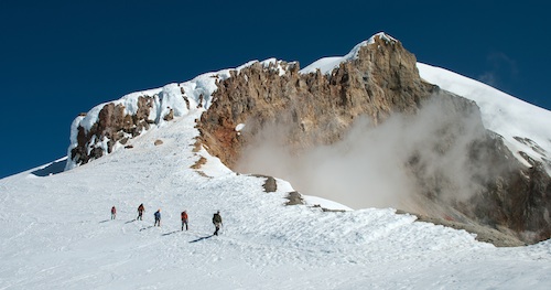 An AAI team descends Pumice Ridge after a successful climb of the Easton Glacier route on Mt. Baker
