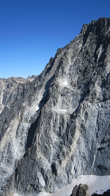 The many ridges of Dragontail Peak rise sharply from Colchuck Lake and offer spectacular climbing opportunities.